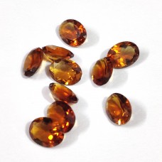 Madeira citrine 8x6mm oval facet  0.92 cts